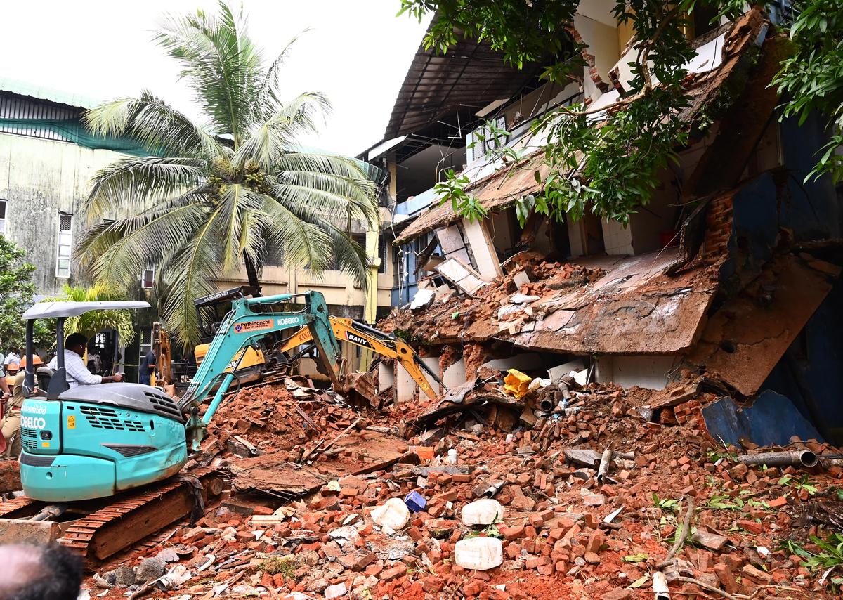 
Excavator machines clearing rubble of the collapsed building at the Government Medical College Hospital, Kottayam.