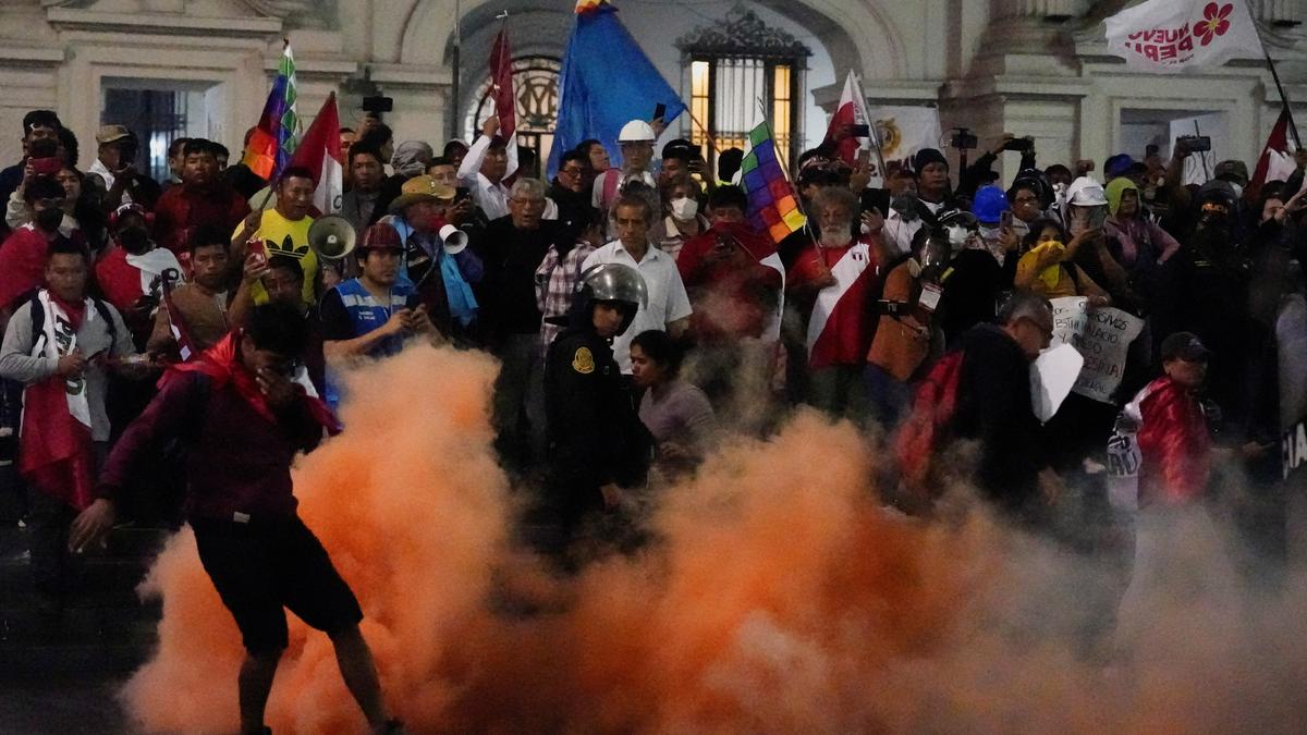 Peru police clash with protesters demanding president step down