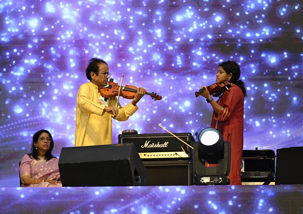 Violinist, L. Subramaniam performing during the inaugural function of 16th Bengaluru International Film Festival.