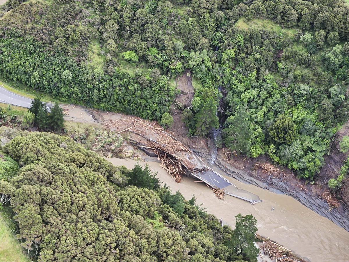 A road between Napier and Wairoa is washed out by floodwater in the aftermath of Cyclone Gabrielle. Climate change worsened flooding from the tropical cyclone that shut down much of New Zealand in one of the country’s costliest disasters, scientists said, but they couldn’t quite calculate how much it magnified the catastrophe.