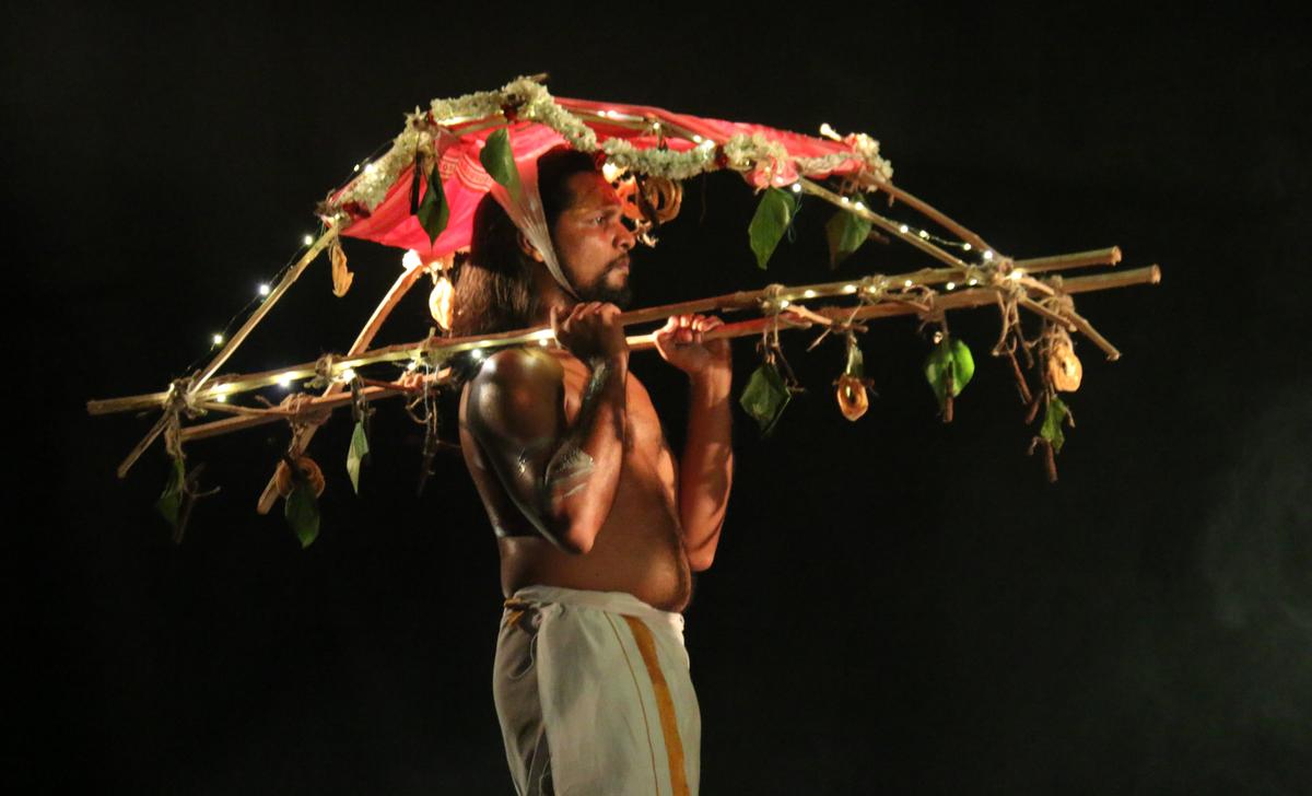 A scene from the play Nada Paavaadai.