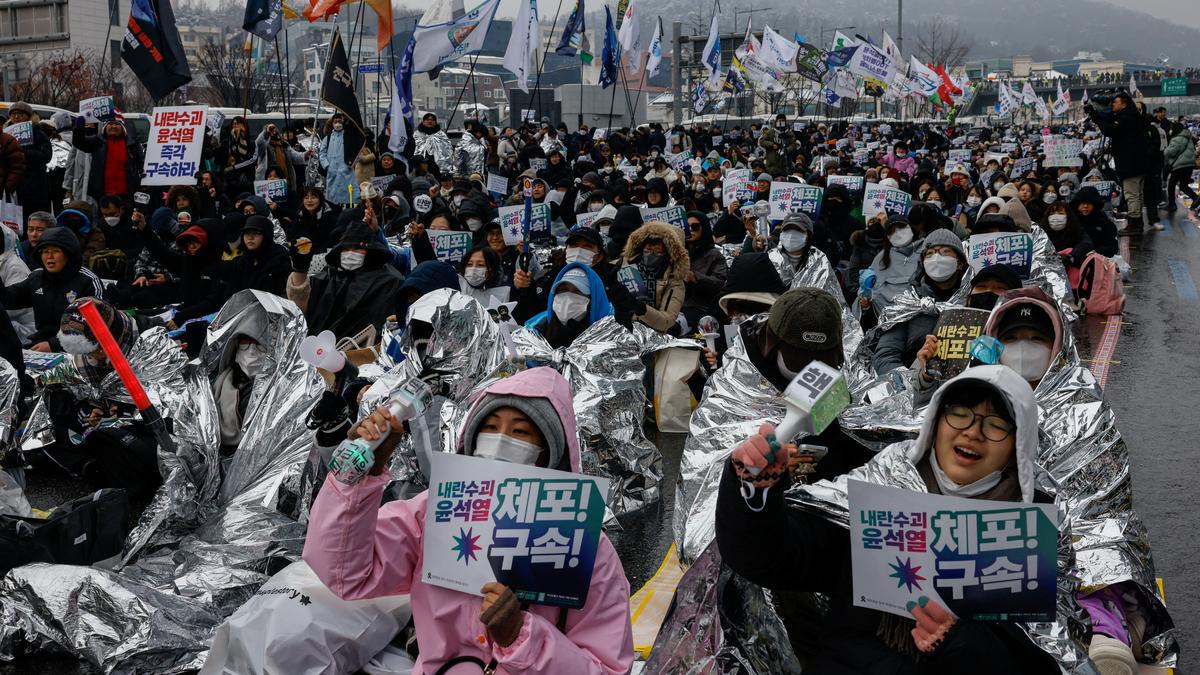 South Korean protesters brave cold to demand Yoon’s ouster as detention deadline looms