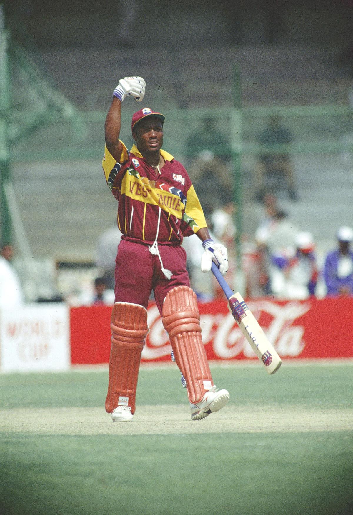 West Indian batsman Brian Lara shows some signal to the dressing room during a quarterfinal match against South Africa in the Cricket World Cup 1996 at Karachi, Pakistan on March 11, 1996. 
