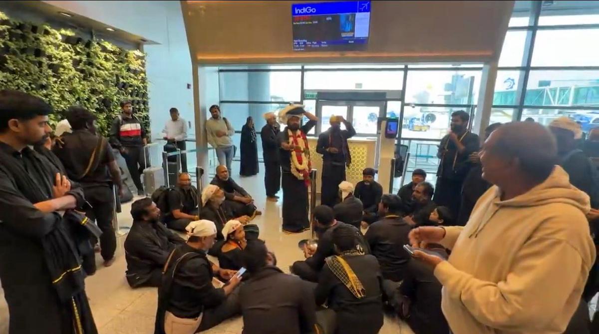 A group of Ayyappa Swamy devotees heading to Sabarimala in Kerala staged a sit-in at the gates.