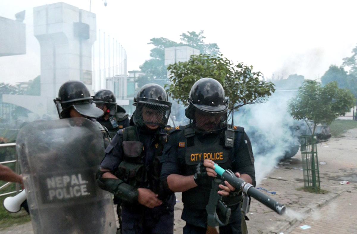 Police use tear gas to disperse people protesting against the government’s decision to block several social media platforms outside the parliament building in Kathmandu on September 8, 2025. Police use tear gas to disperse people protesting against the government’s decision to block several social media platforms outside the parliament building in Kathmandu on September 8, 2025.