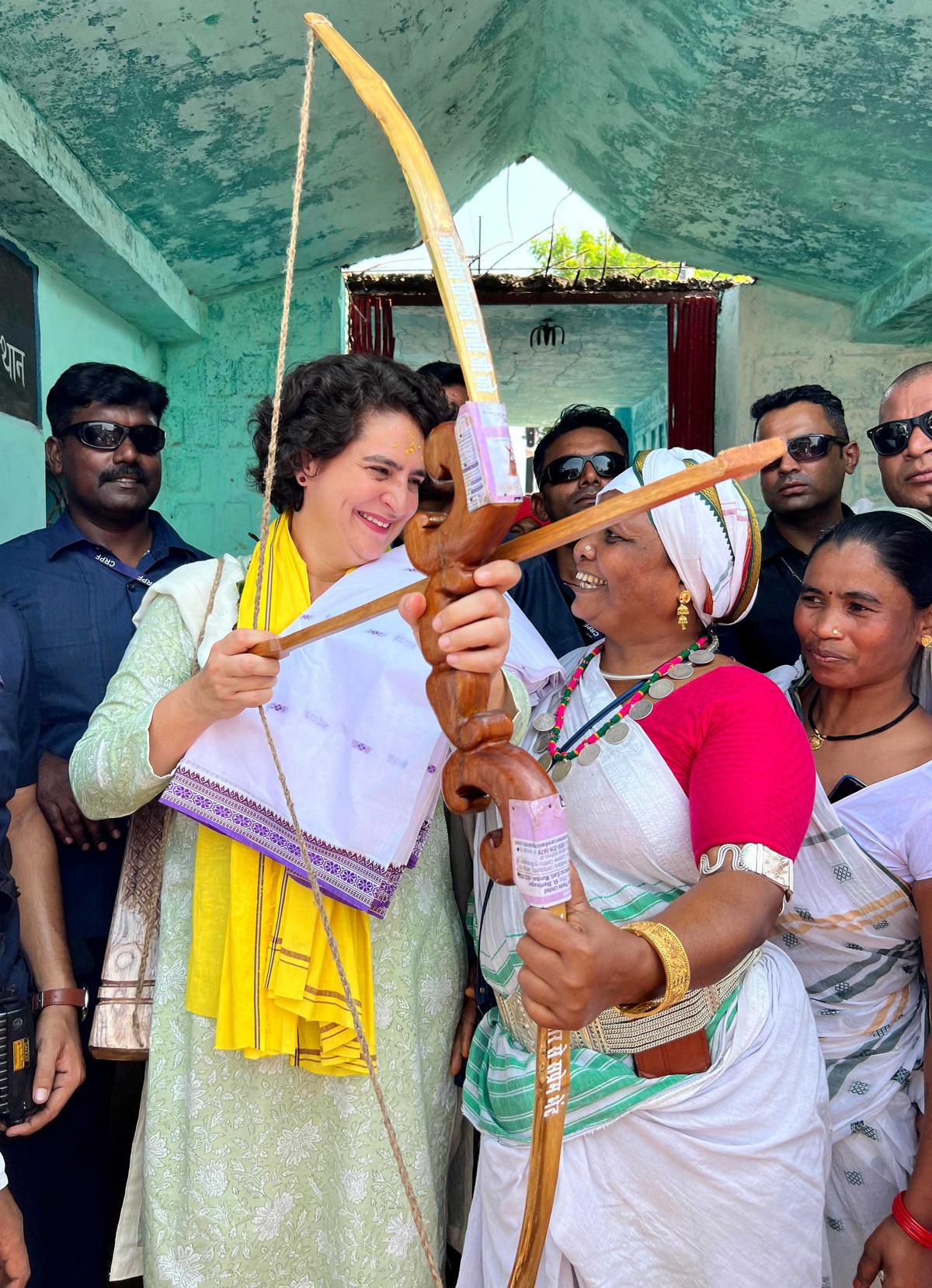 AICC General Secretary Priyanka Gandhi Vadra with tribals during a public meeting, in Mandla, on Oct. 12, 2023. AICC General Secretary Priyanka Gandhi Vadra with tribals during a public meeting, in Mandla, on Oct. 12, 2023.