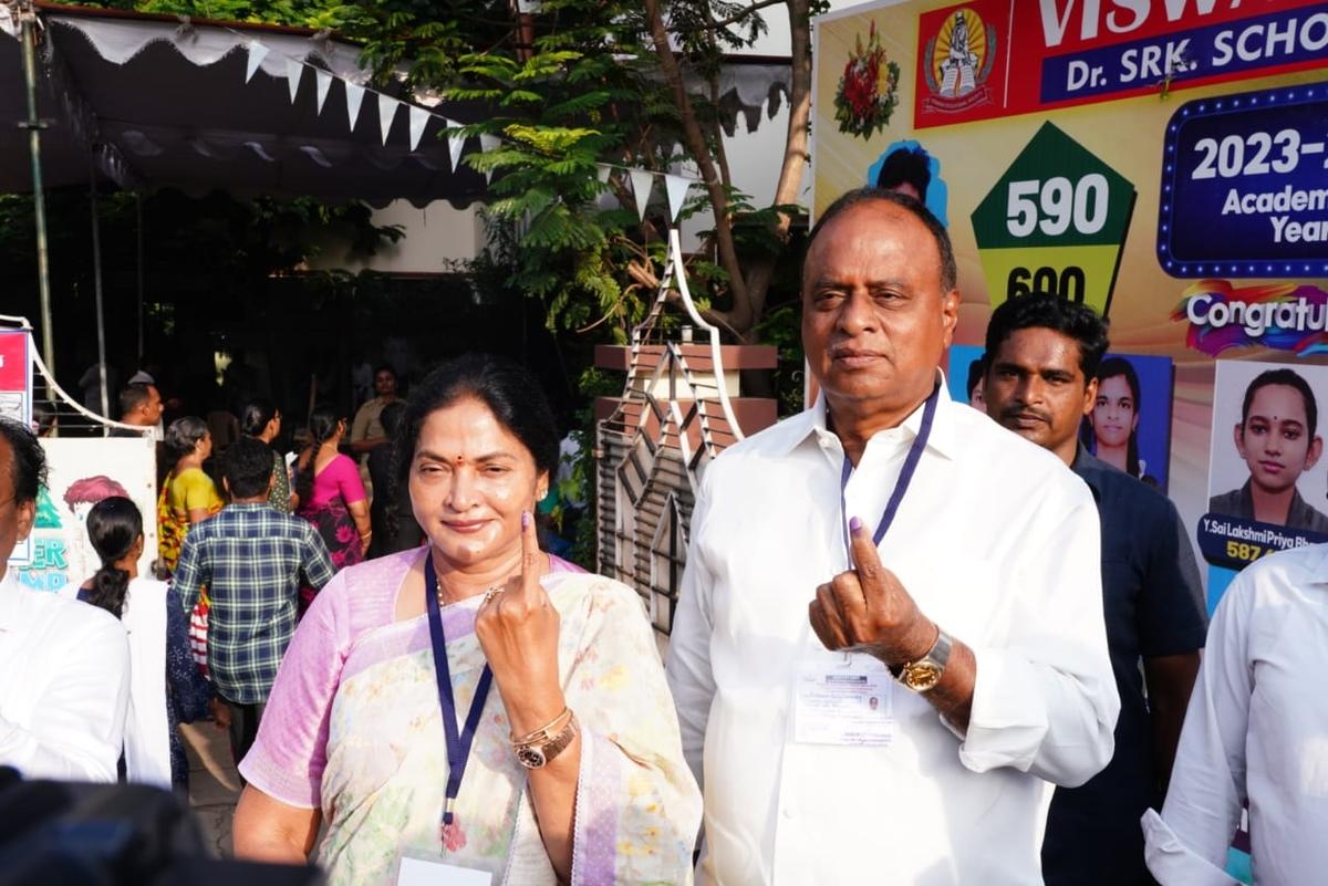 TDP Nellore MP candidate Vemireddy Prabhakar Reddy with his wife and TDP Kovur MLA candidate Vemireddy Prashanti Reddy after casting their votes at SRK English Medium School.