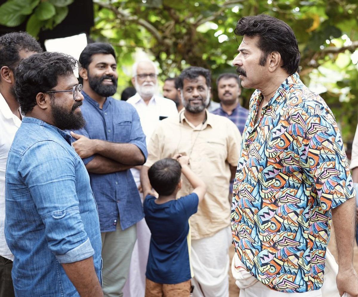 (From left) Adarsh Sukumaran, Paulson Skaria, Jeo Baby and Mammootty on the set of Kaathal - The Core