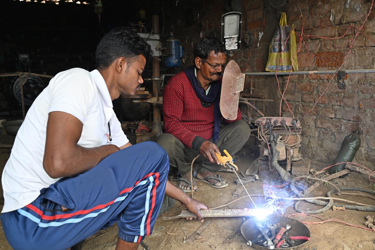 Ramesh and Vikash Vishwakarma, the father and the brother of Mithilesh, who is stuck in Benghazi, Libya. 