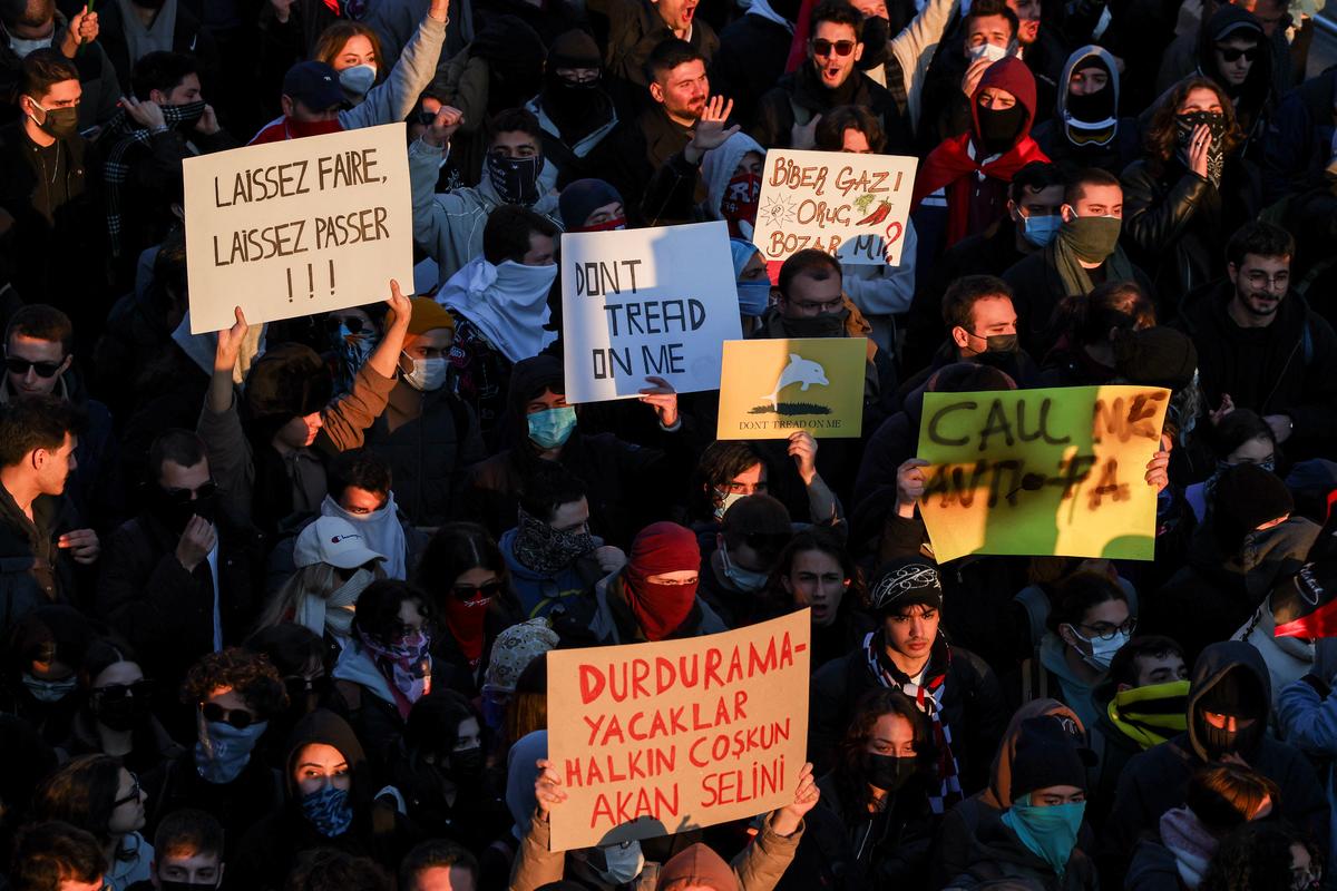 Students from several universities hold placards as they take part in a protest against the detention of Istanbul Mayor Ekrem Imamoglu, in Istanbul, Turkey, on March 21, 2025.