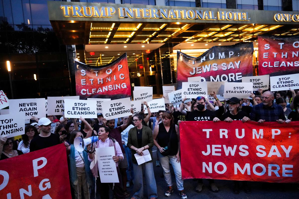 Protestors block the road outside of Trump International Hotel during a rally against the hunger crisis in Gaza that organizers say is caused by Israel, in New York City, U.S., August 4, 2025.