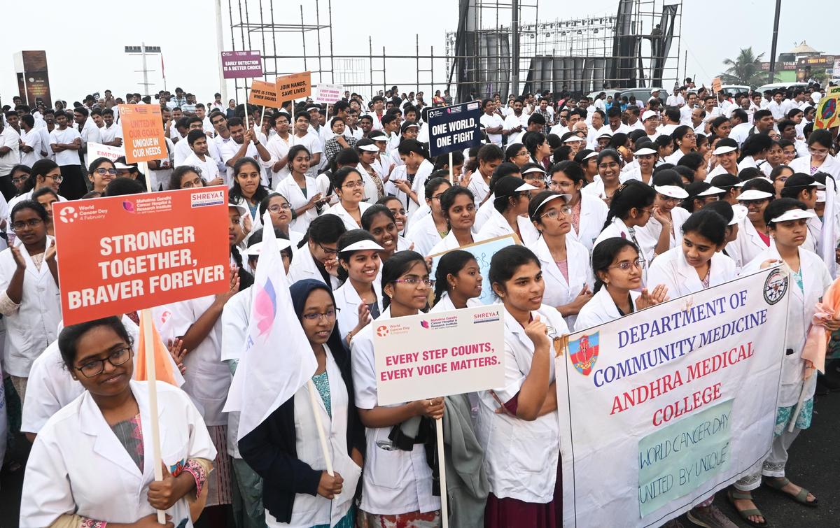 Medical students and citizens taking part in the Walkathon organised by the Mahatma Gandhi Cancer Hospital and Research Institute, on the Beach Road in Visakhapatnam on Sunday.