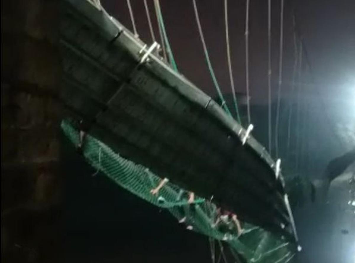 Over 100 fall into river after suspension bridge collapses in Gujarat's Morbi