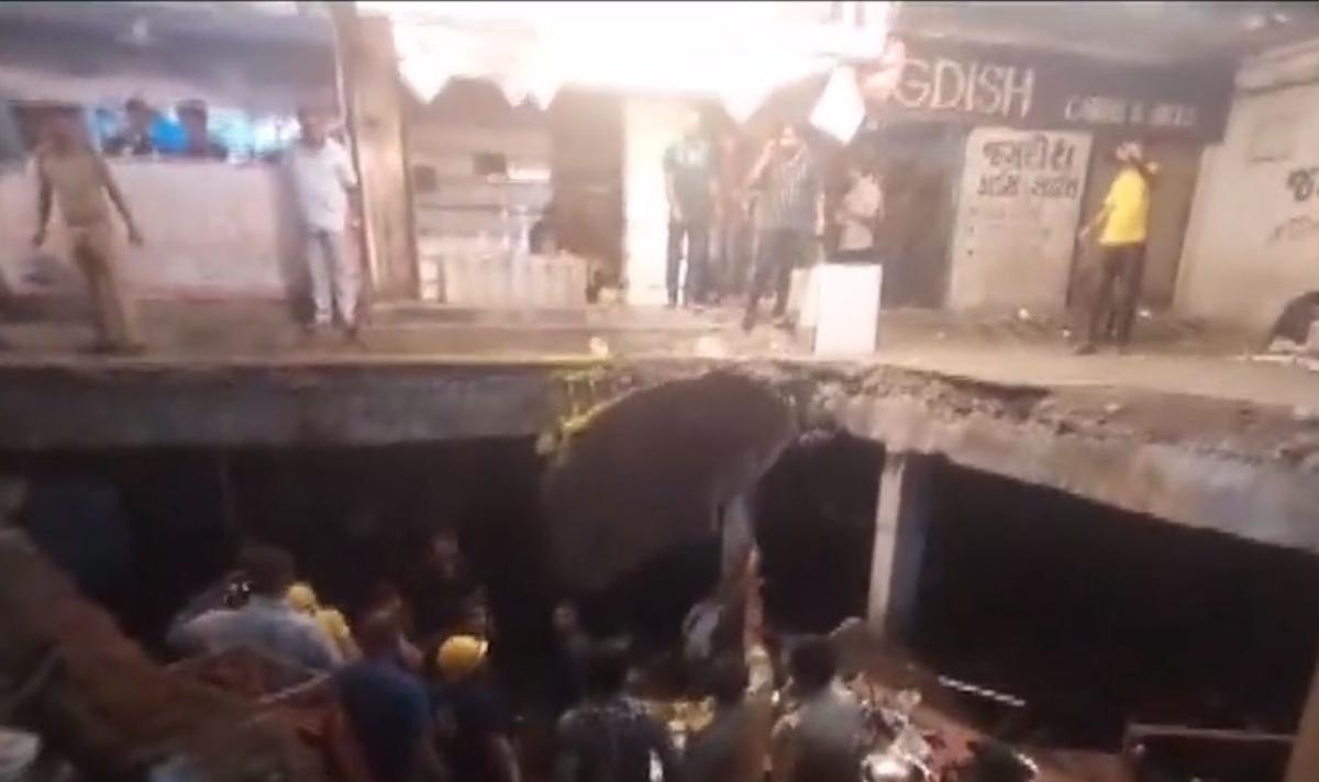 At least 12 injured after drainage slab caves in under weight of crowd in Rajkot - The Hindu