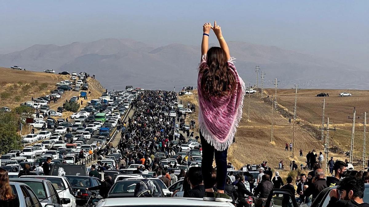 Iran security forces open fire as thousands mourn Mahsa Amini