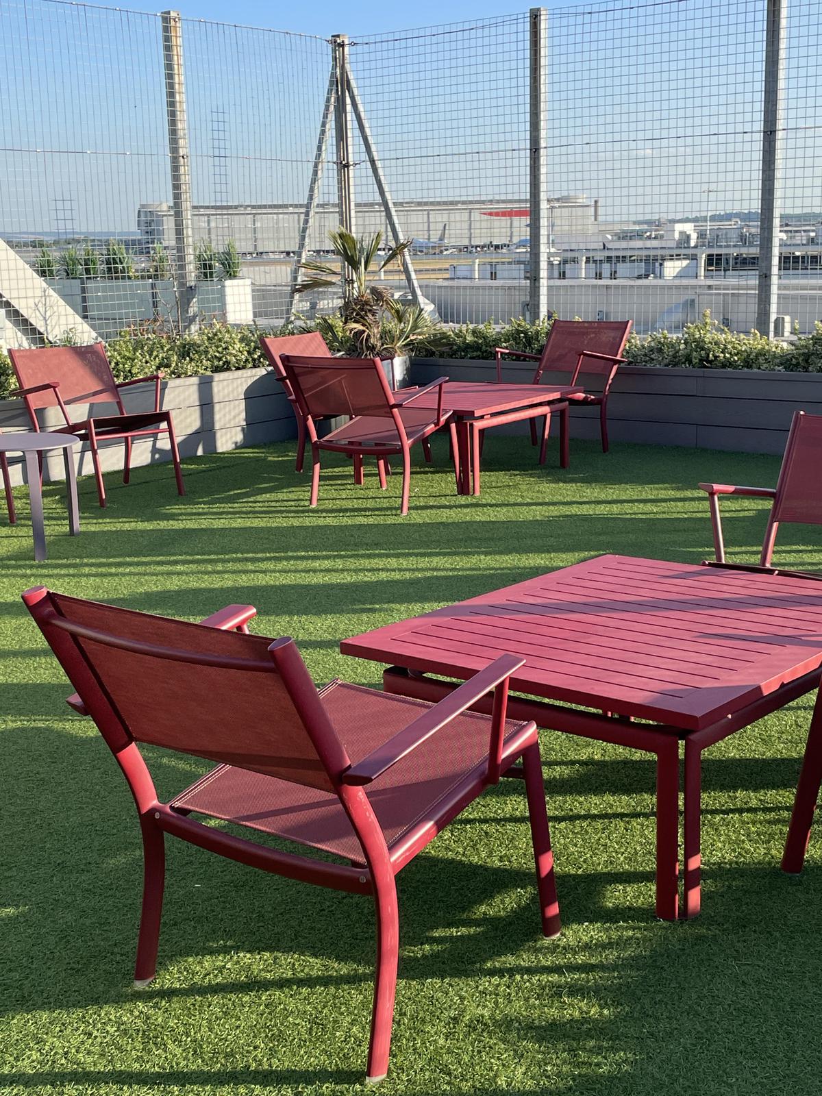 The runway is visible from the rooftop garden of Virgin Atlantic's Heathrow Clubhouse