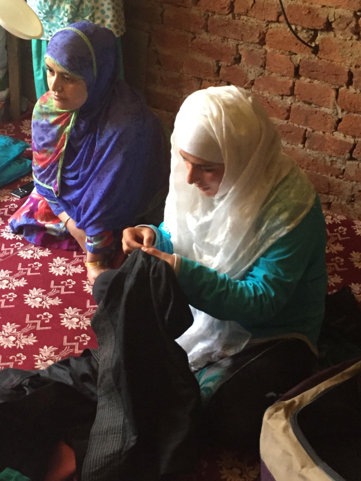 Women embroidering