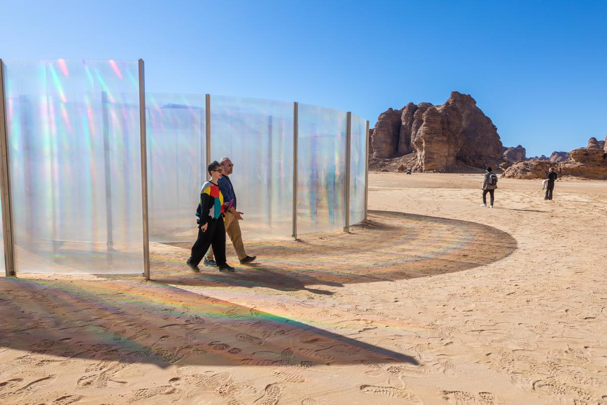 Guests tour an art installation by Kimsooja, titled To Breathe, in AlUla