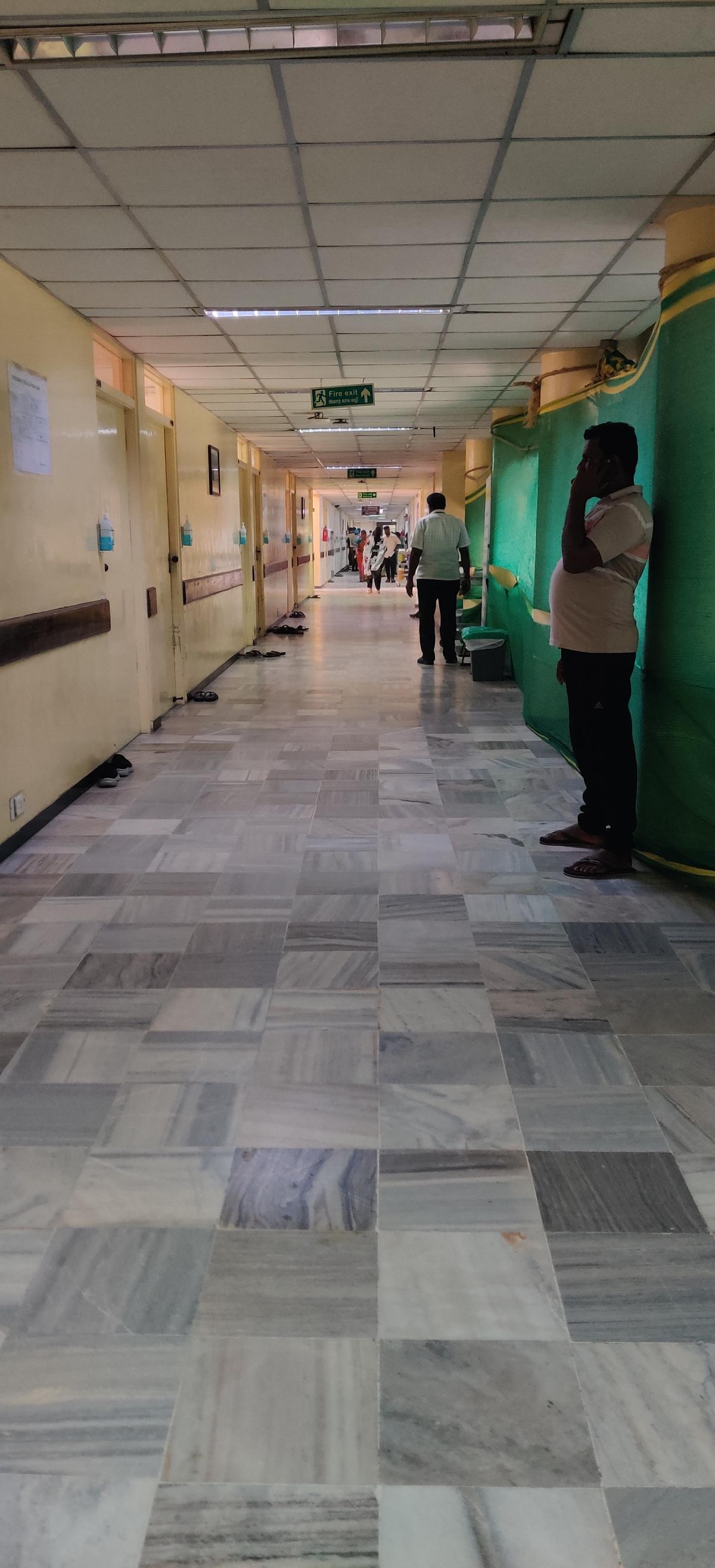 The hospital corridor, where families await news of the new-born