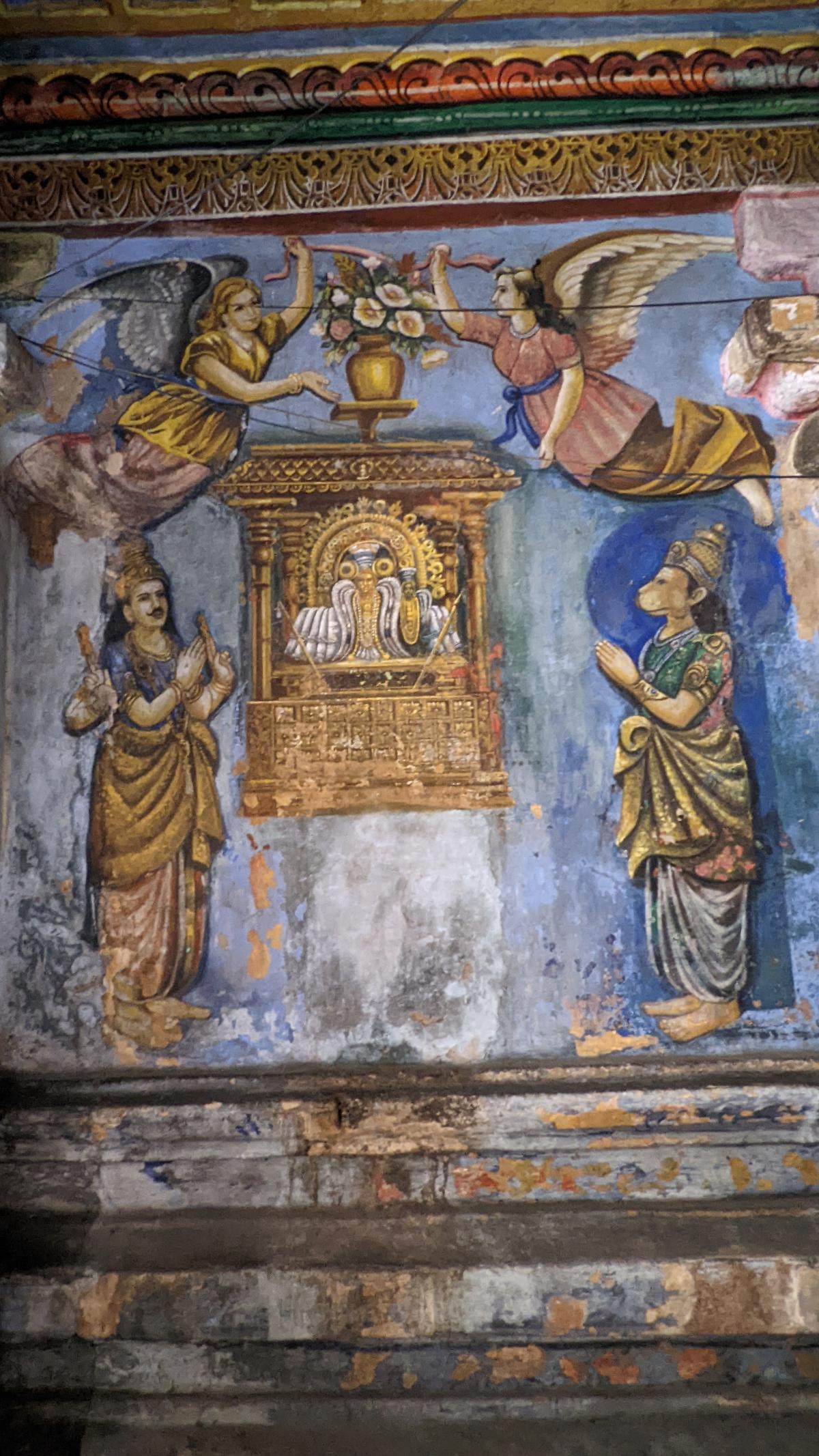 Cherubs painted alongside Hindu deities