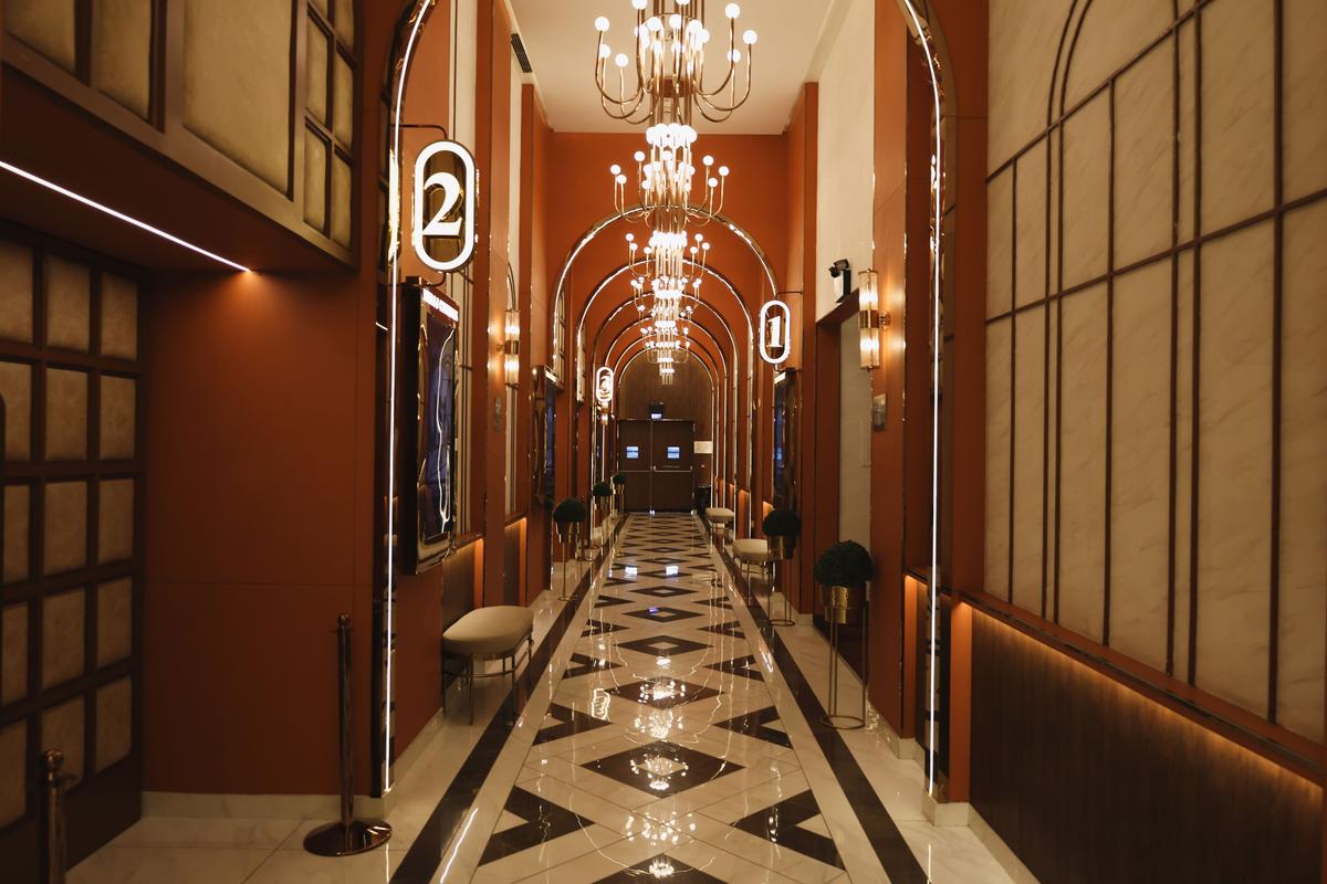 Aesthetically, the redesign theme draws from Art Deco and classic cinema heritage