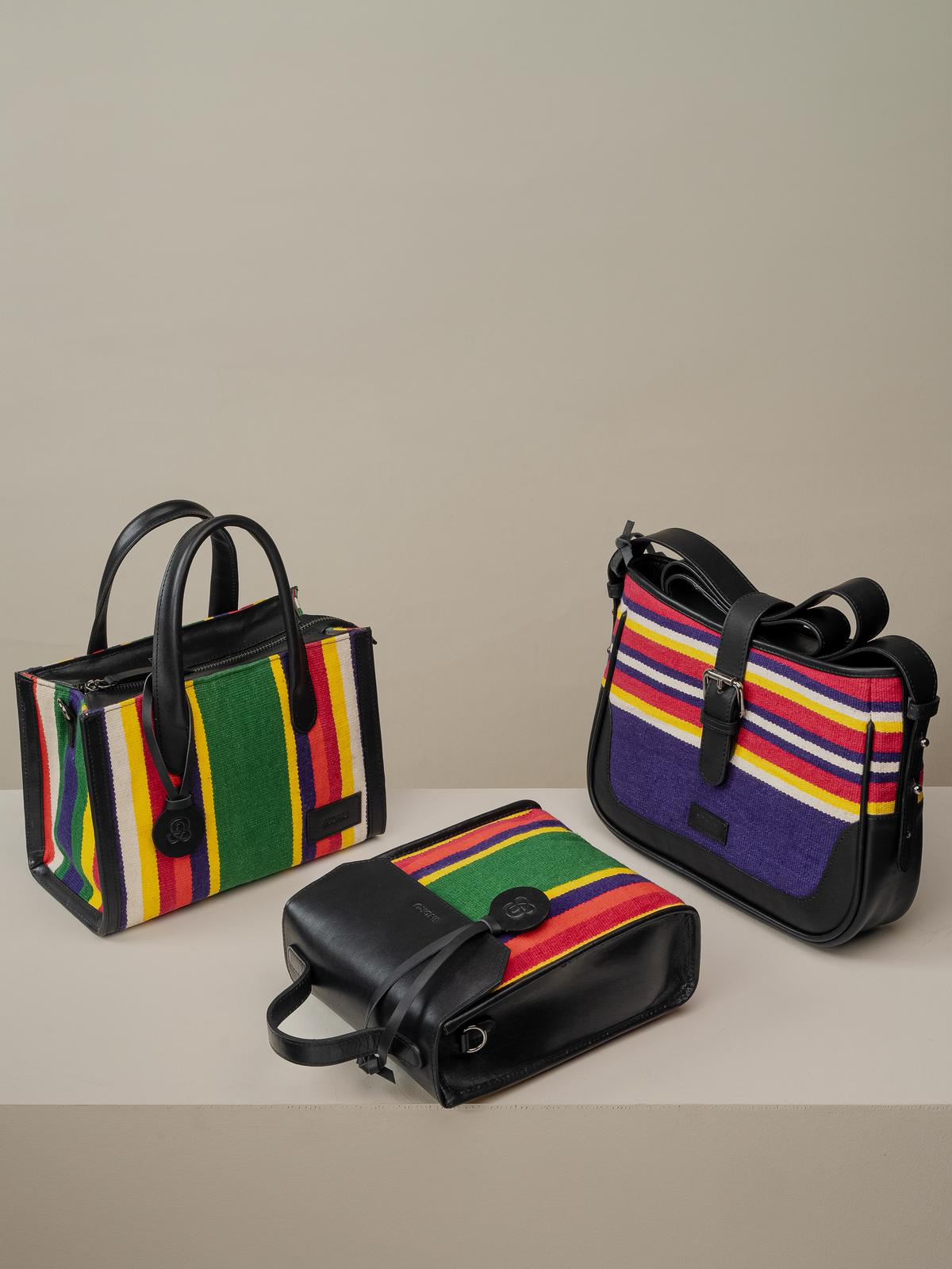 The jamakkalams are woven specially for these bags, which have leather trimmings and handles