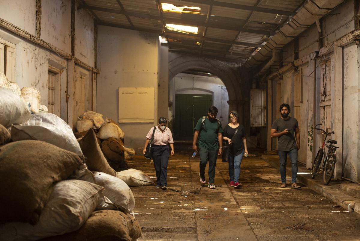 Curator Shubigi Rao touring the warehouses