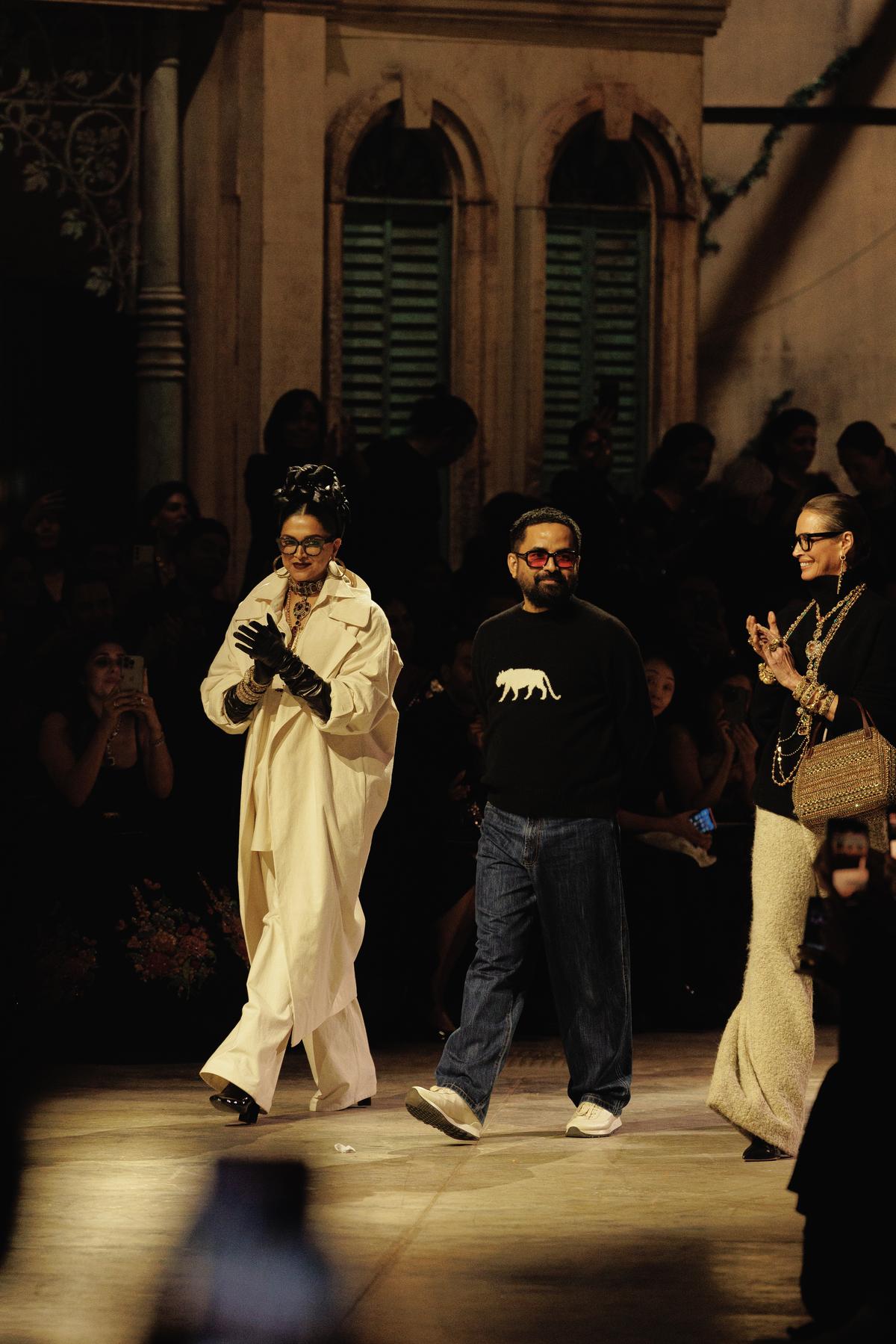 Mukherjee with (left) Deepika Padukone and Christy Turlington