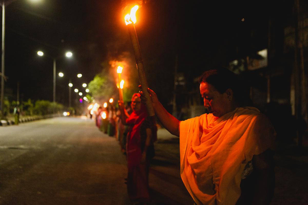 Meira paibis (torch bearers) gathered in the streets to protest against the demand of seperate administration