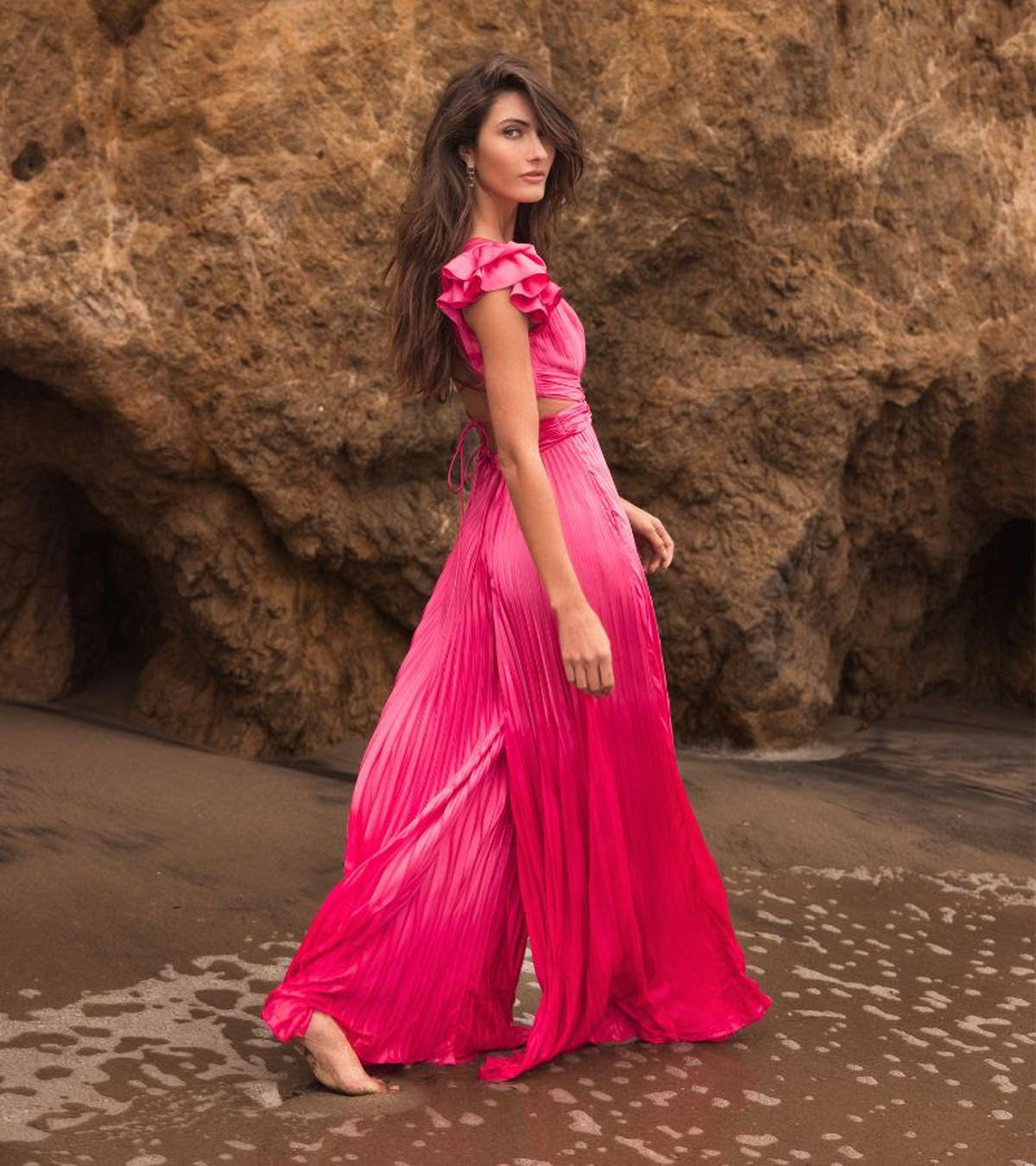 Mac Duggal’s designs, inspired by his Indian roots, blend the opulence of hand-beaded Indian designs with a romantic-edgy modern twist