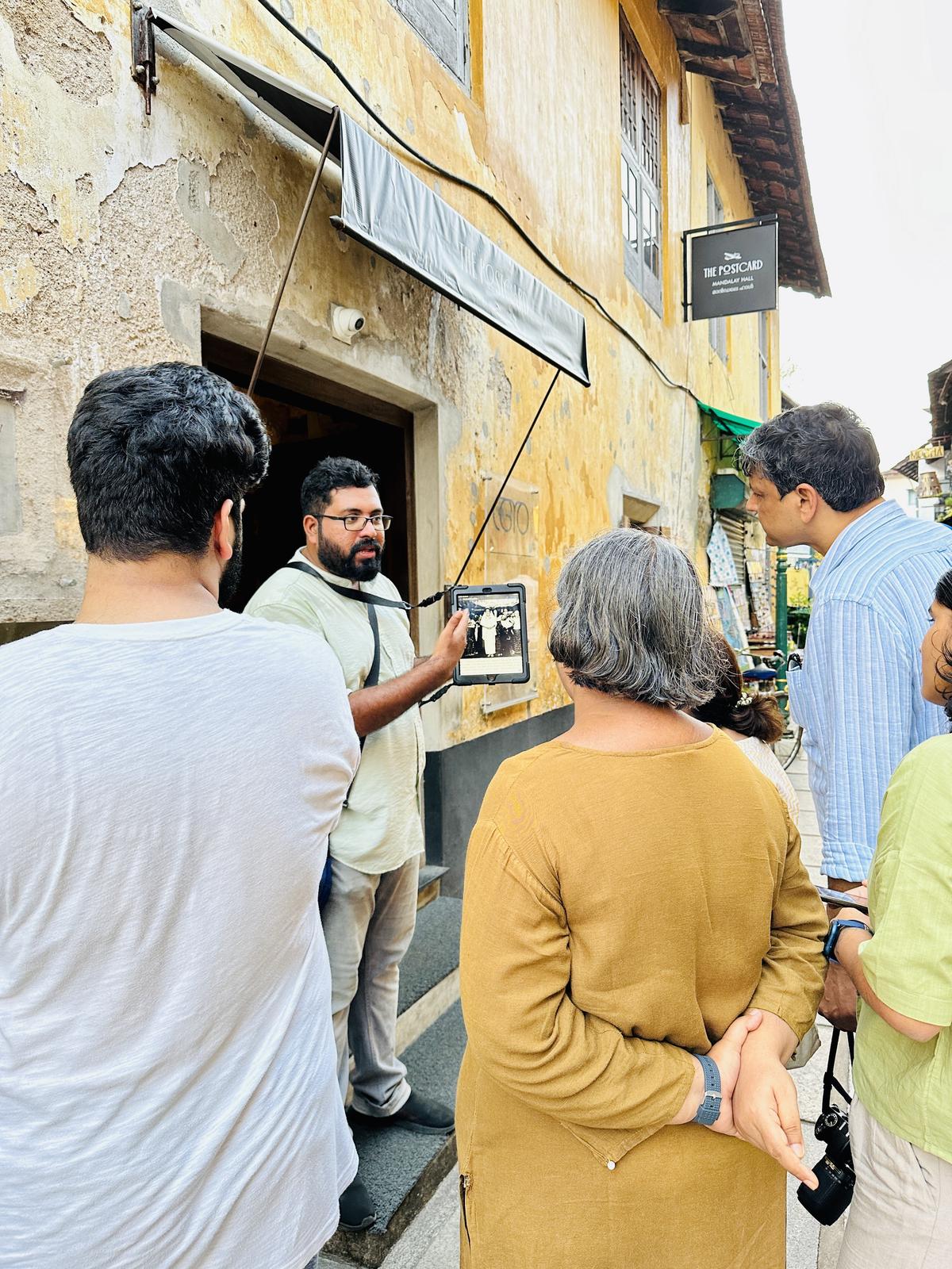 Johann Kuruvilla leading a walk in Fort Kochi