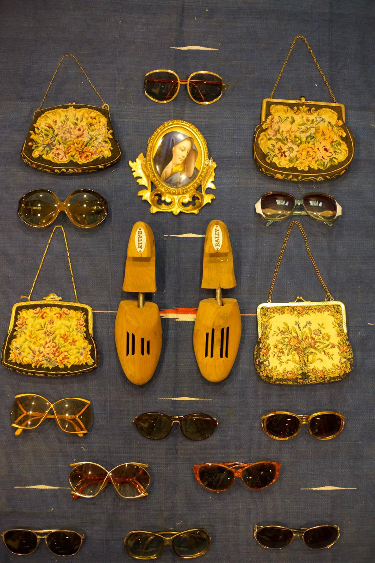 The showcase offers 30 sunglasses, brooches and Christian art
