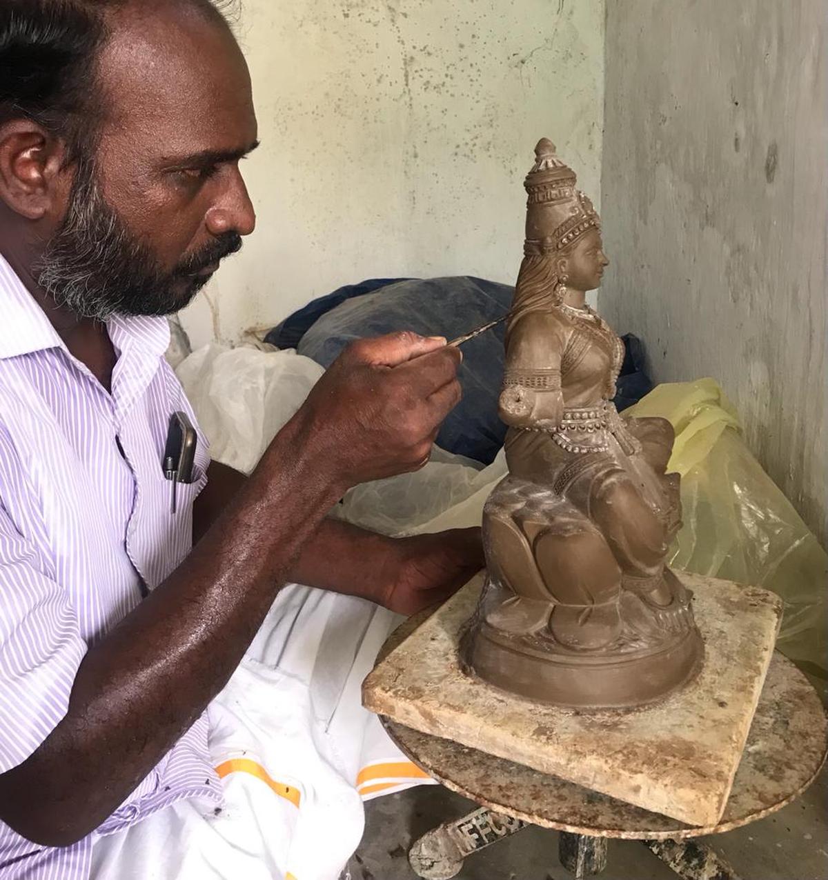 A doll maker in Kanchipuram A doll maker in Kanchipuram