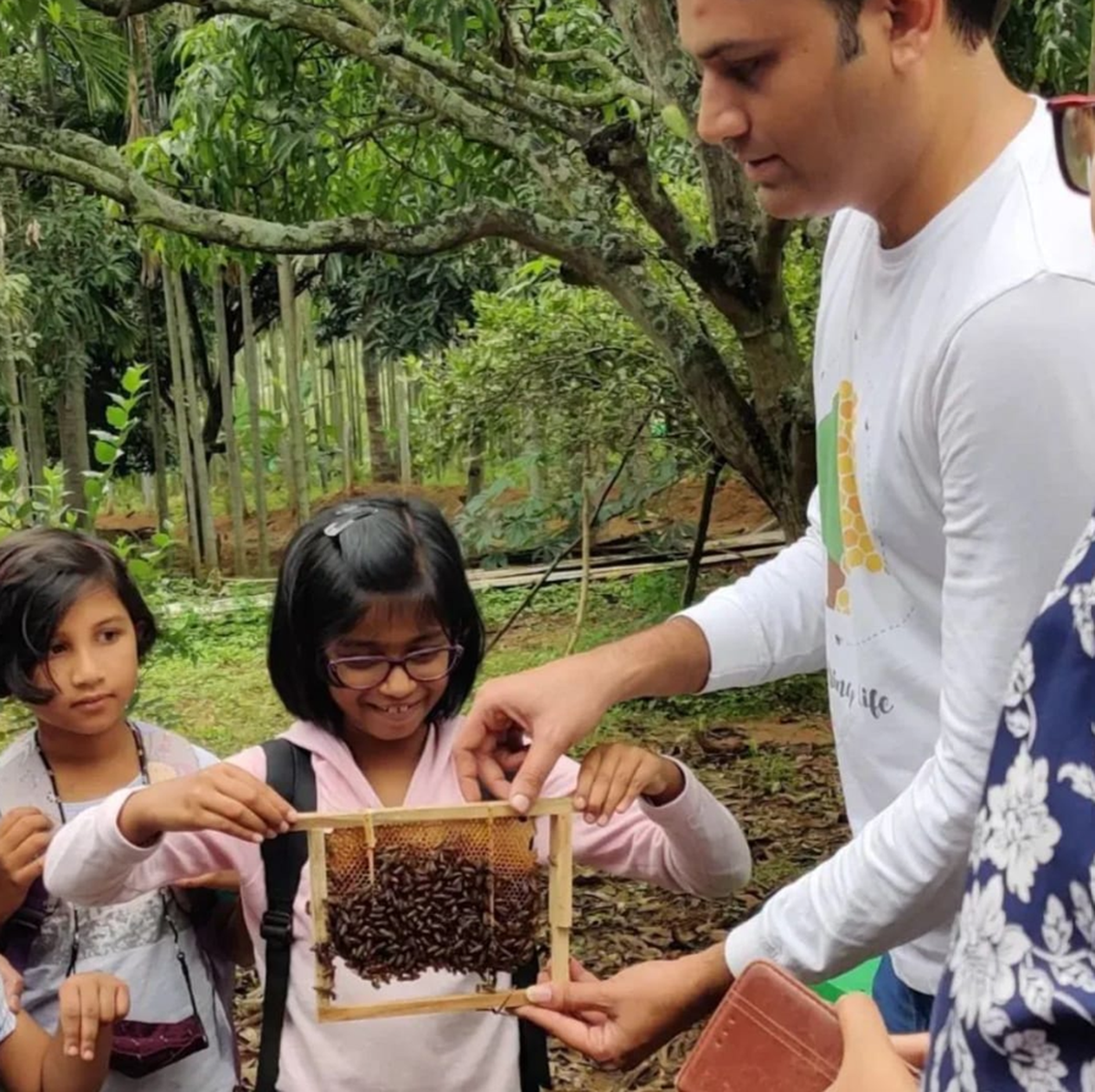 Apoorva B.V. introducing bees to children at one of his workshops