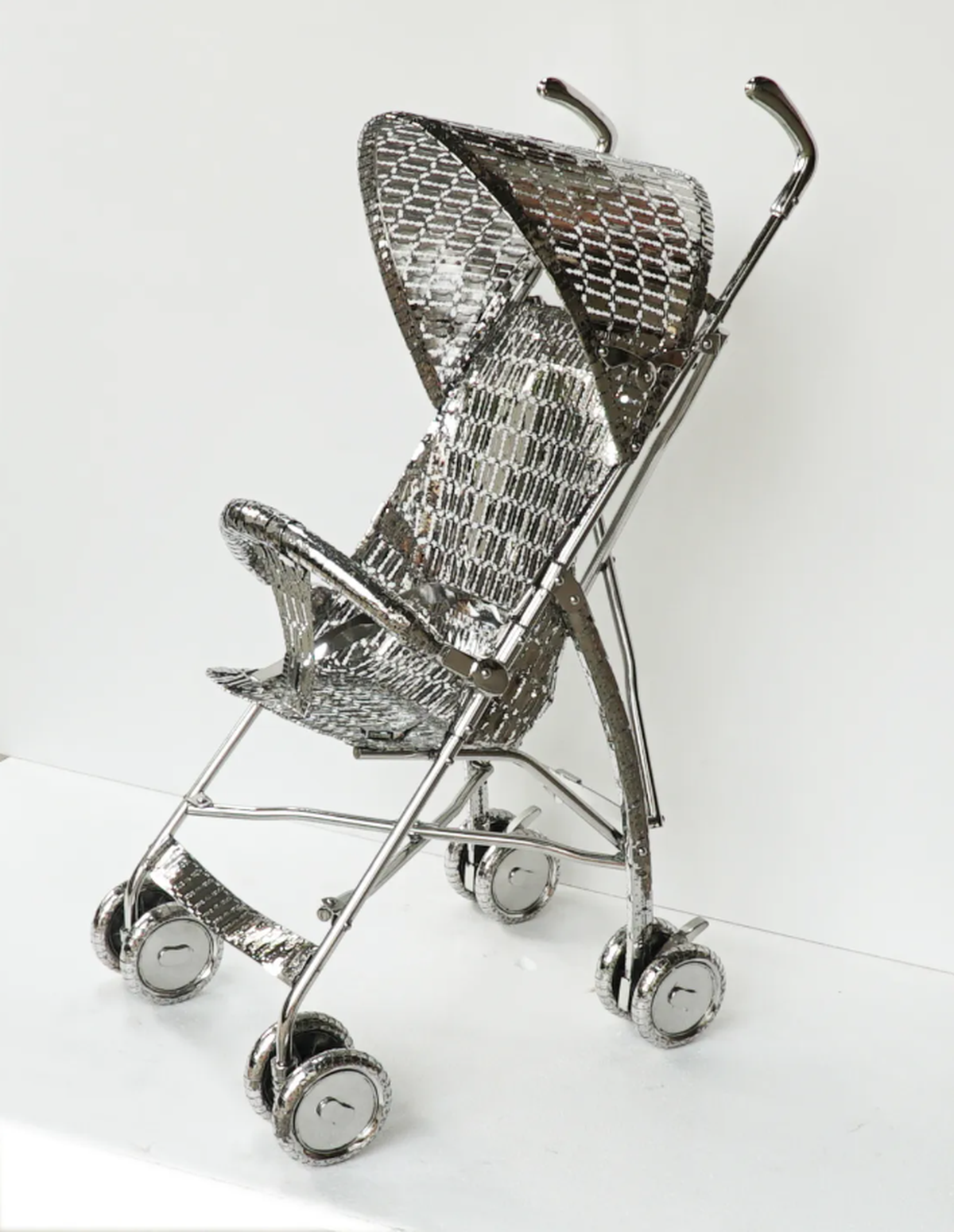 Tayeba Begum Lipi’s sculpture of a baby stroller made from razor blades