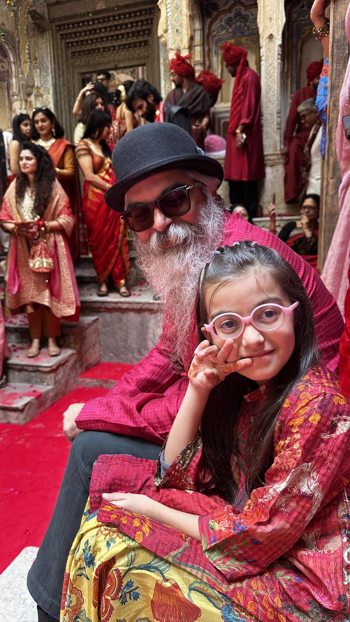 Suket Dhir and his daughter, who is wearing his design