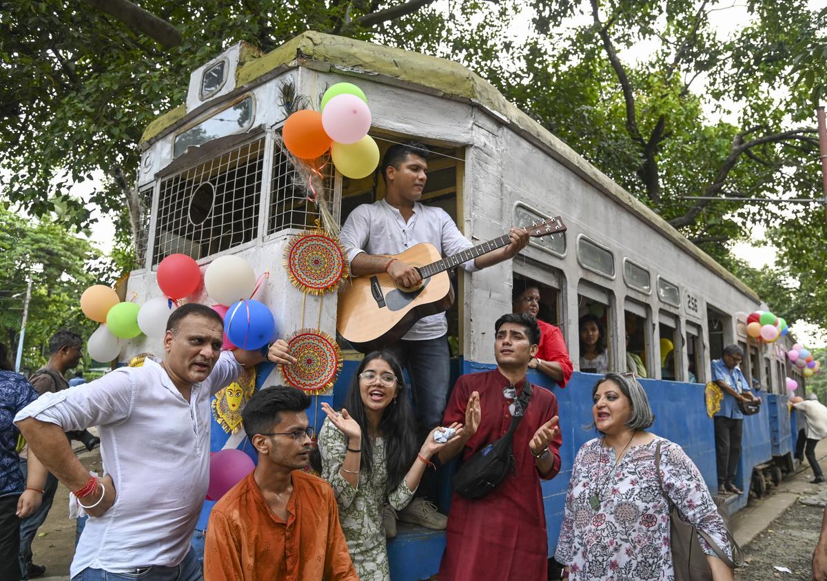 Tram lovers perform a song