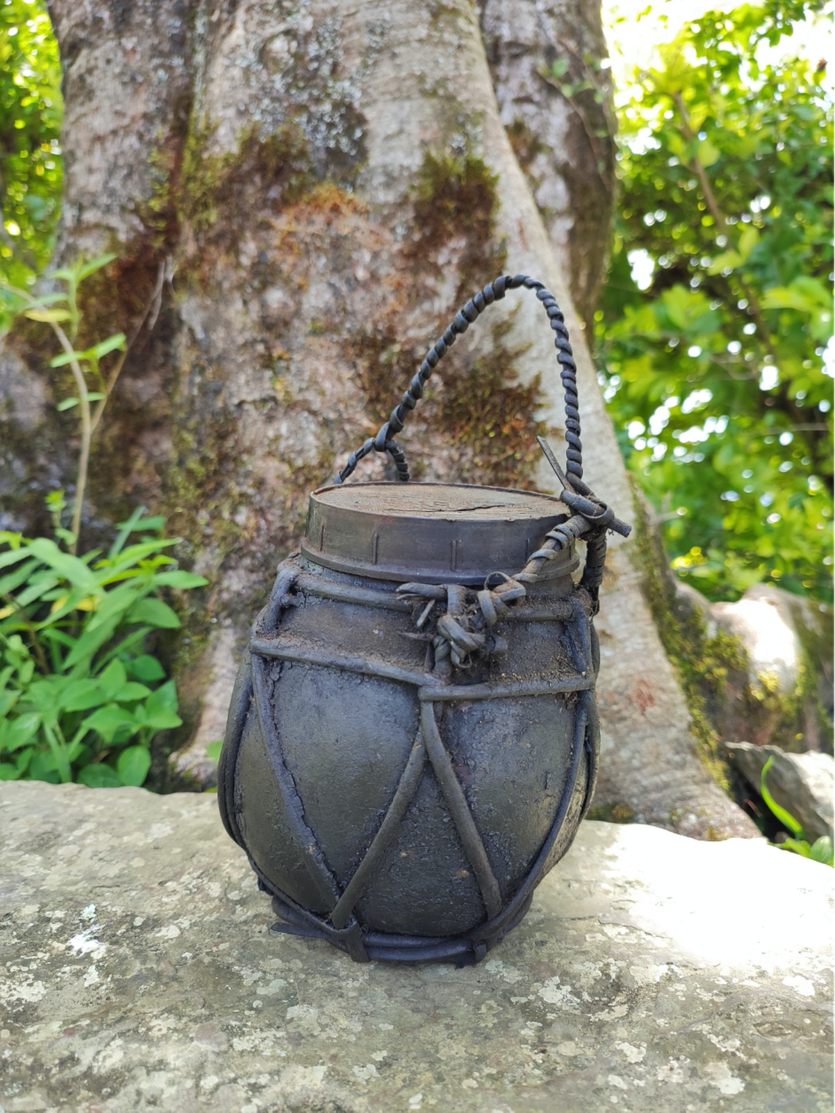 The traditional ganaeng tamdui kou (container for mustard leaves chutney)