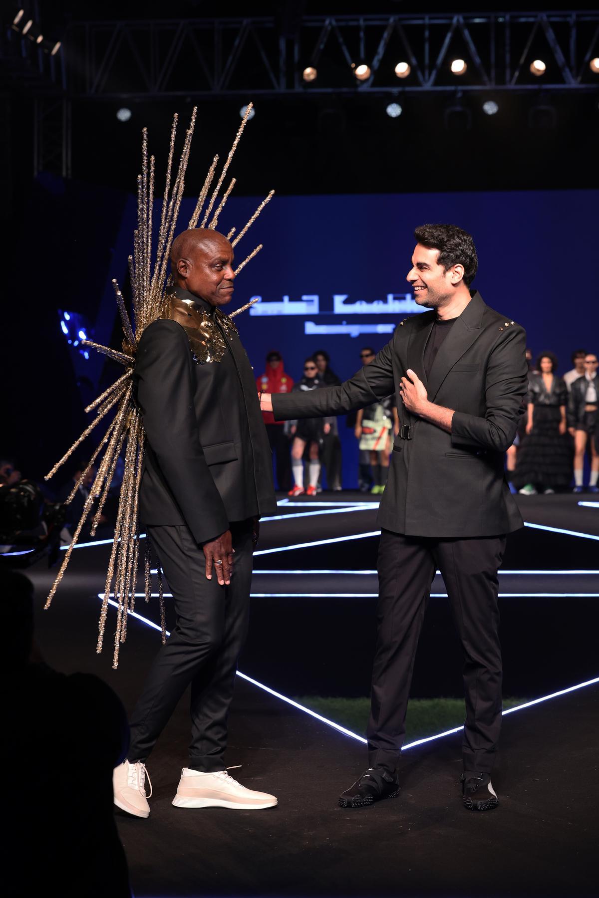 (Left) Carl with Sahil Kochhar