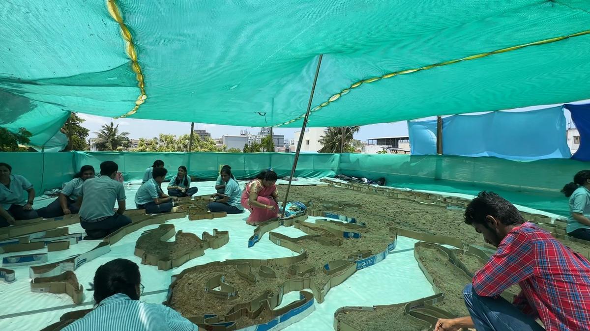 Students and teachers work on the project Students and teachers work on the project