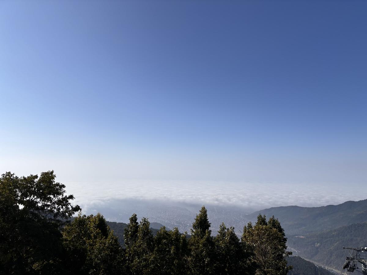 As the cabin glides over the valley, Butwal unfolds below — a mosaic of hills, houses and roads
