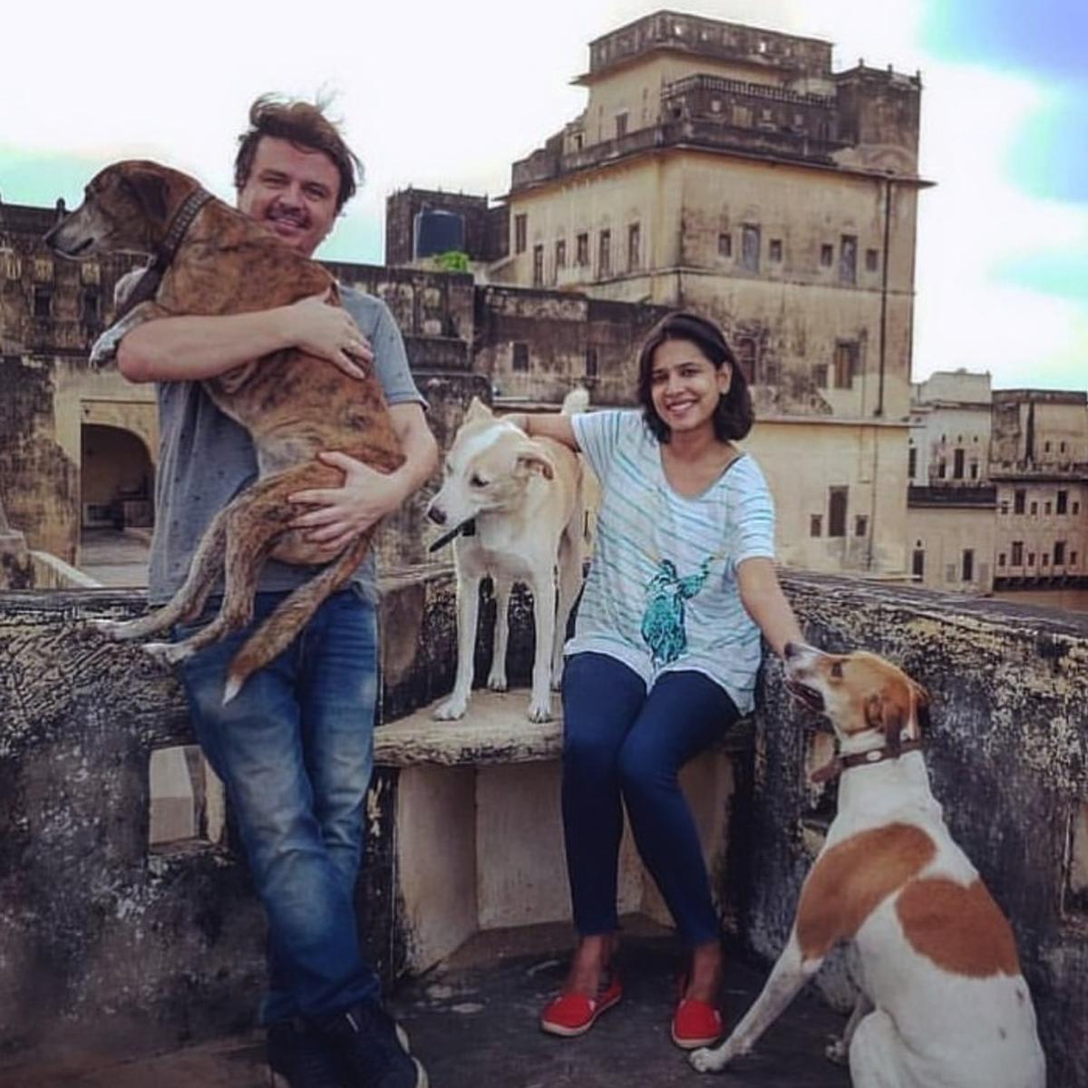 Divya currently lives in Bangkok with her husband, kids, and dogs Pari and Marco Polo Divya currently lives in Bangkok with her husband, kids, and dogs Pari and Marco Polo