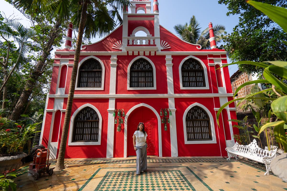 The bright red façade of the mansion