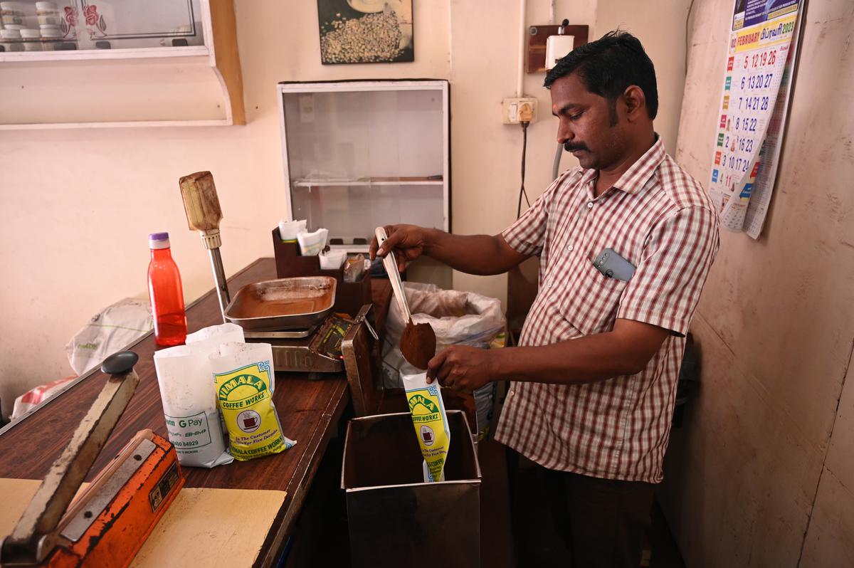 Packing coffee powder at Vimala Coffee, RApuram.