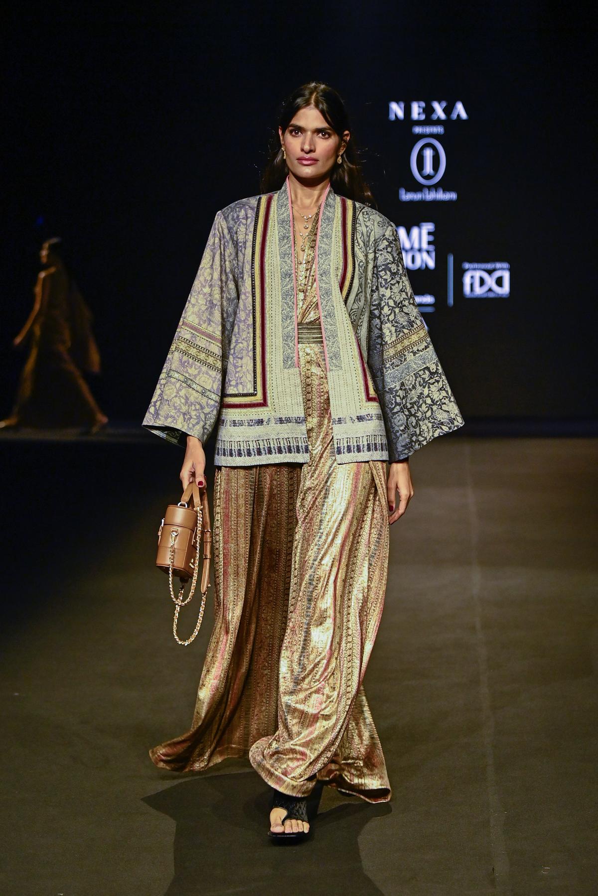 Model  walks the ramp during the show of Nexa Presents OTT by Tarun Tahiliani 