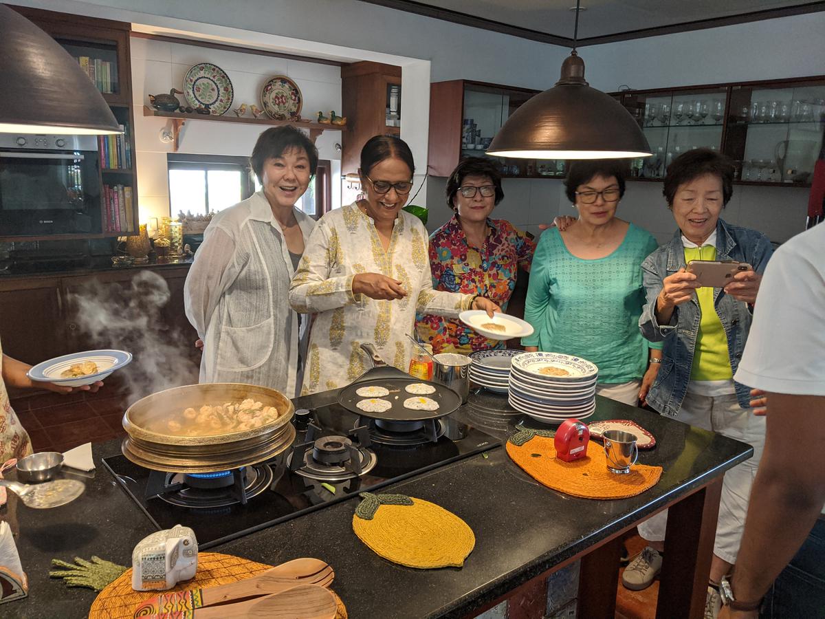 Nimmy Paul (second from left) leading a class