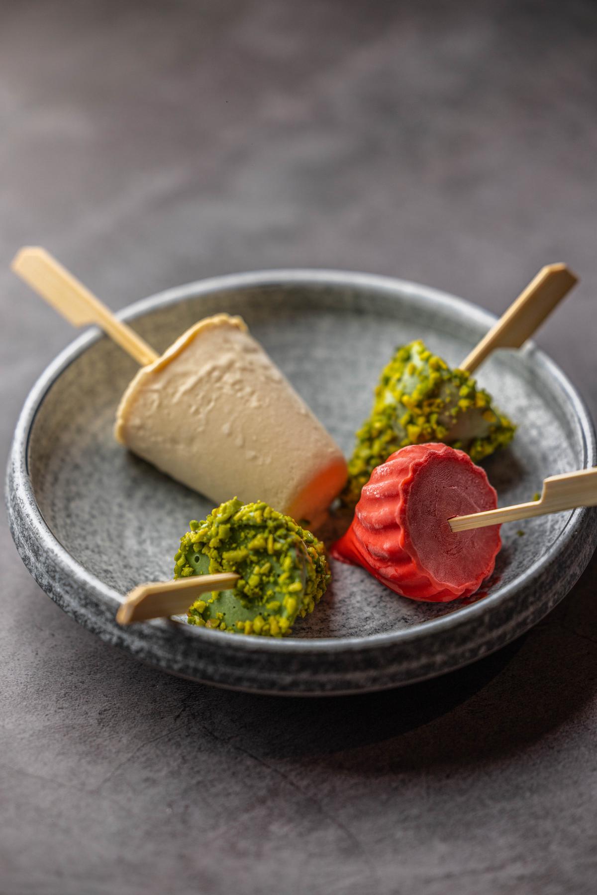 A kulfi assortment in flavours of malai, pistachio, and summer berries