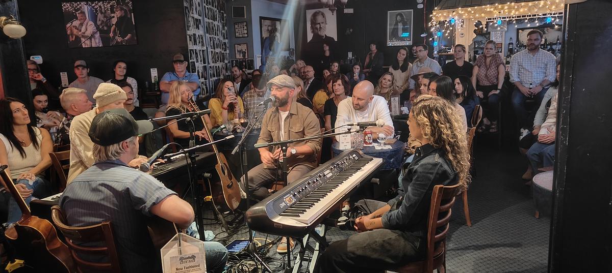 Drew Holcomb performing at Bluebird Cafe
