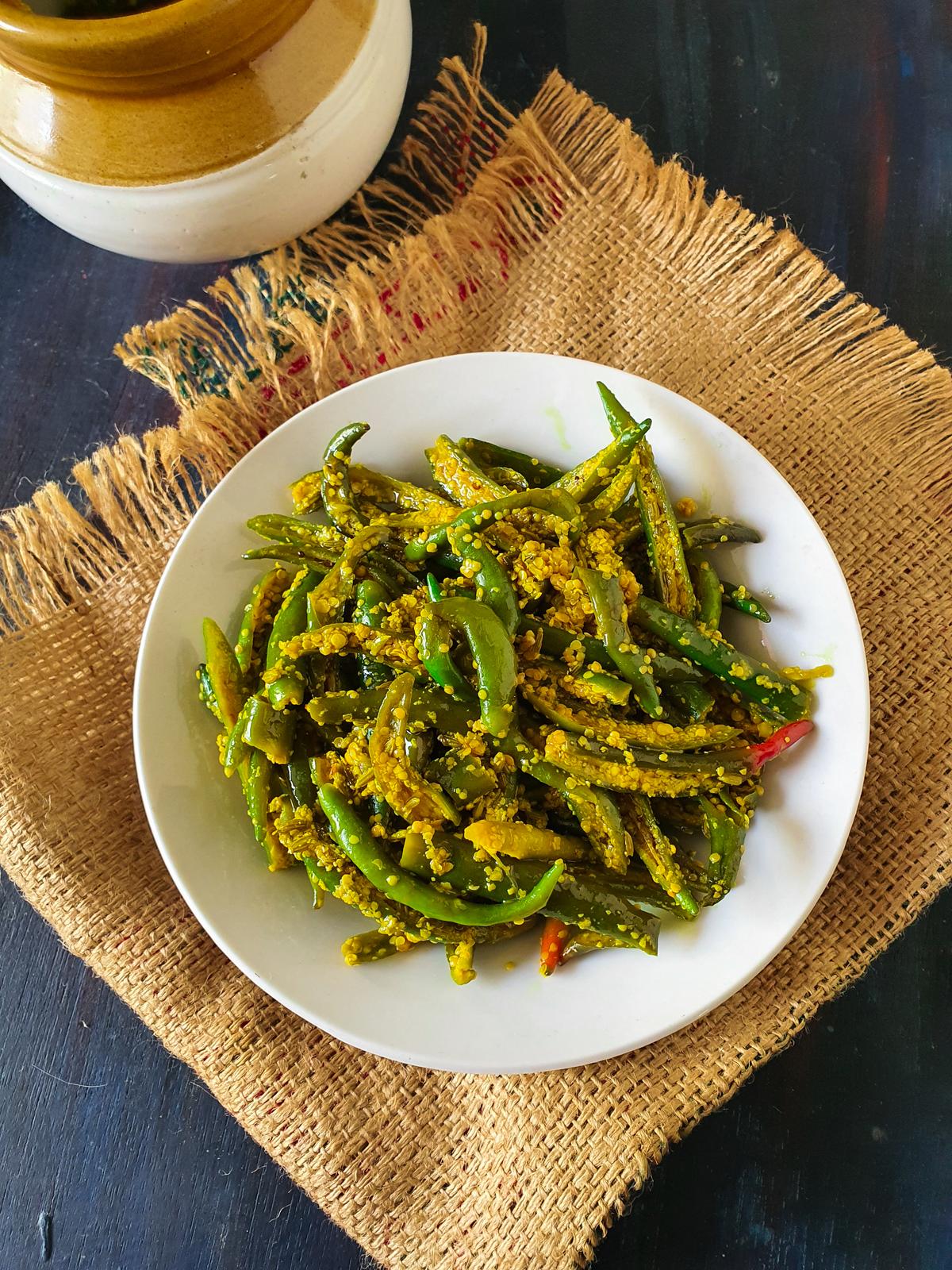 Chilies pickled with mustard seeds, salt and lemon juice