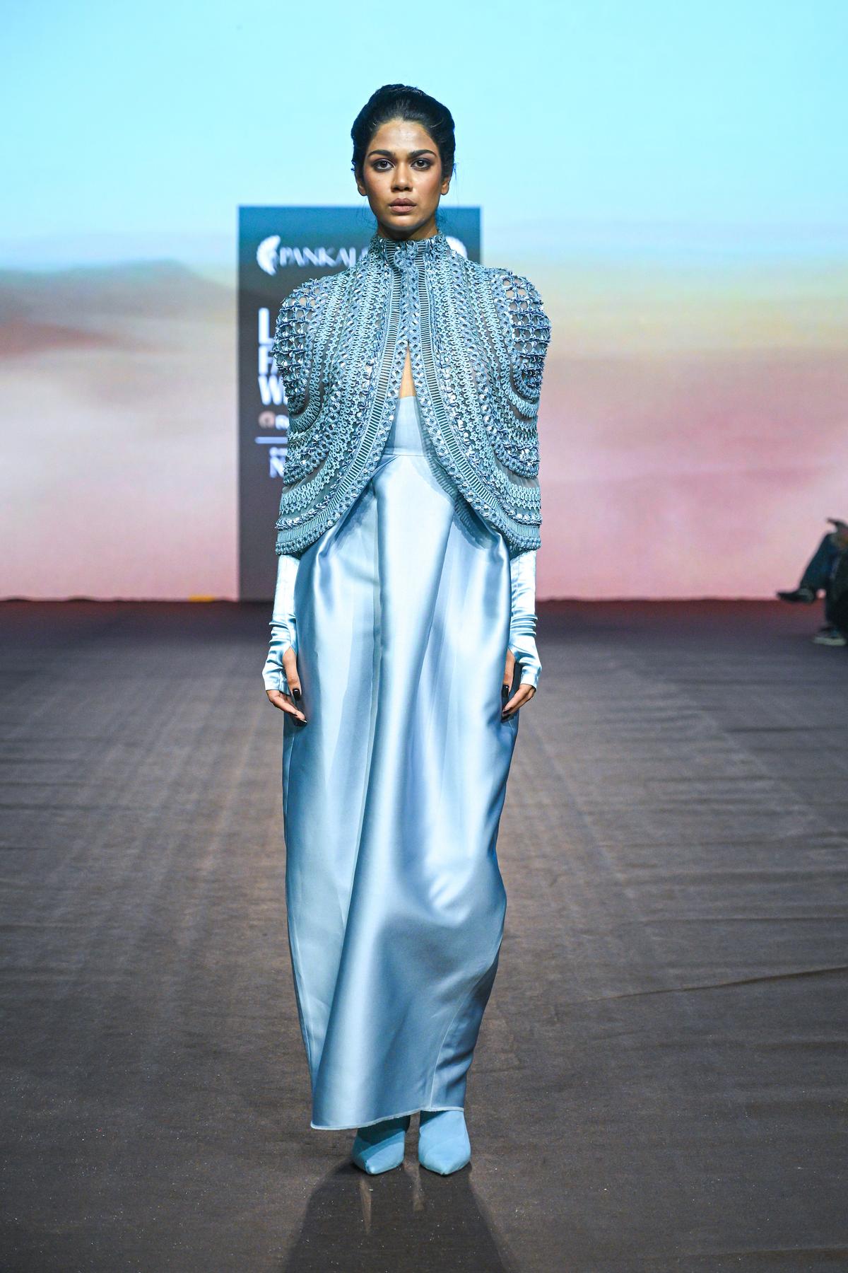 A model walks the ramp for designer Pankaj & Nidhi Ahuja show during Lakmé Fashion Week 2025, held on October 11th at The Grand New Delhi, India.

Photo : FS Media Pro / FDCI x Lakme Fashion Week / RISE Worldwide